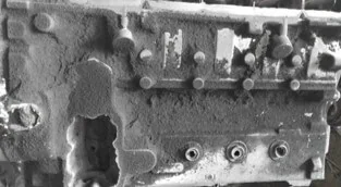 Casting with sand sticking defects using coal dust and mould coating